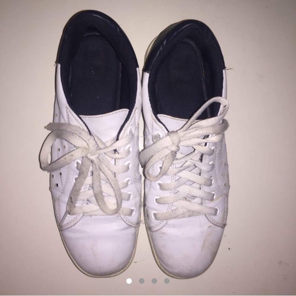 white & navy blue sneakers